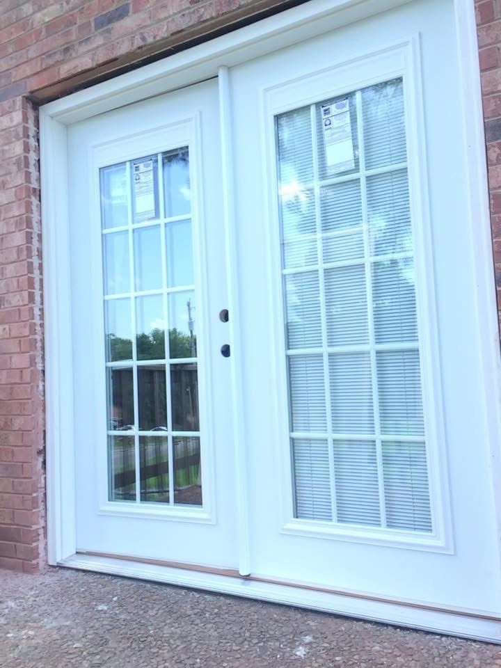 Close-up of new French doors with built-in blinds