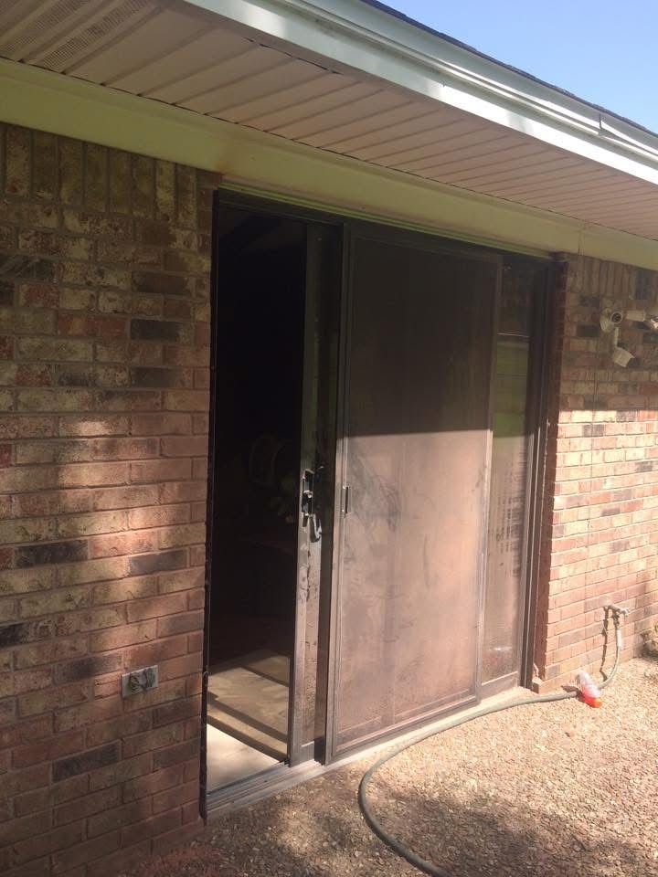 Old sliding glass door before replacement